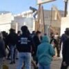 Iran protesters try to break into government building as unrest continues