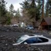California downpours ease but flood and mudslide risks linger